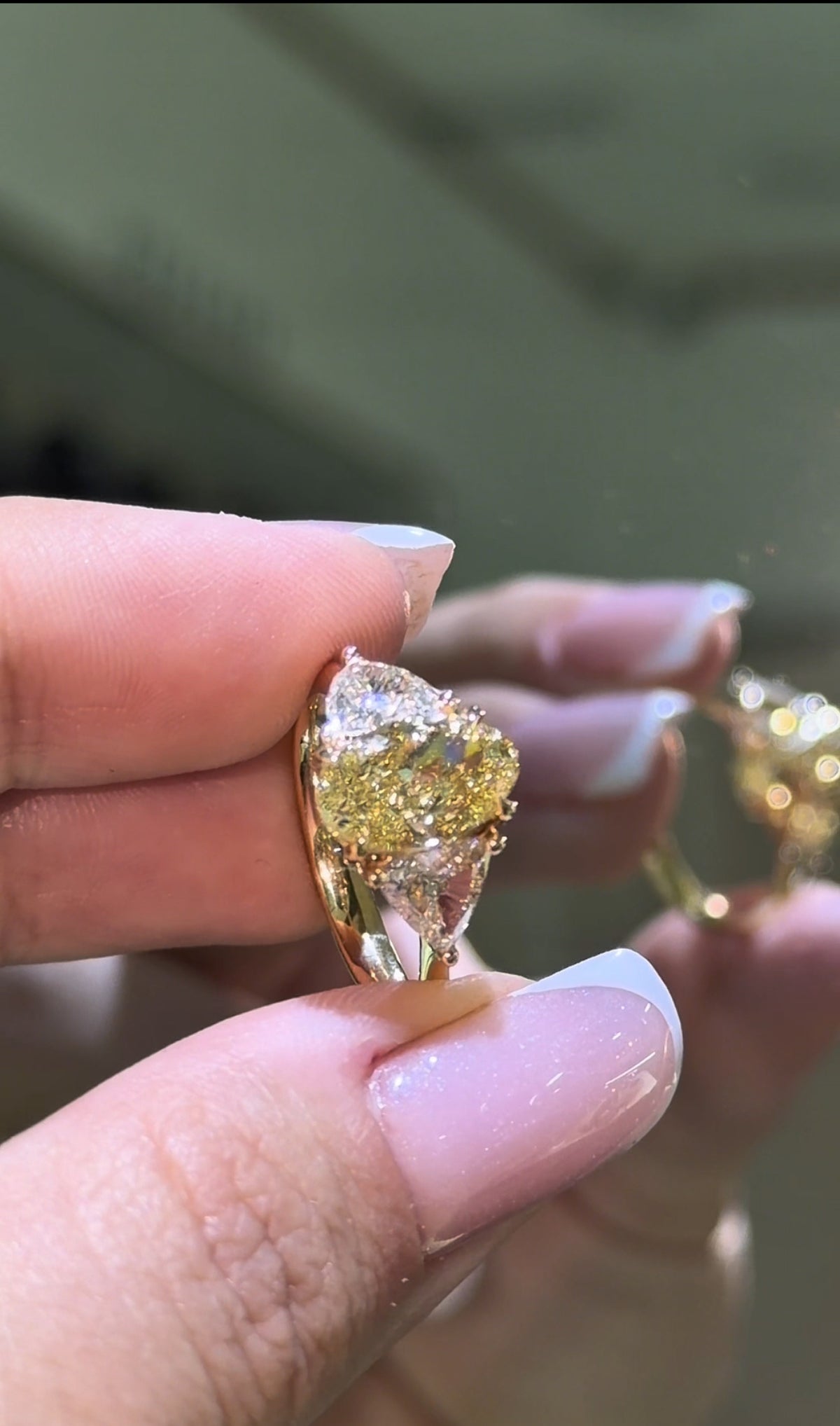 1.9 Carat Fancy yellow Oval With Side Hearts Diamond Ring (ARJS4199)