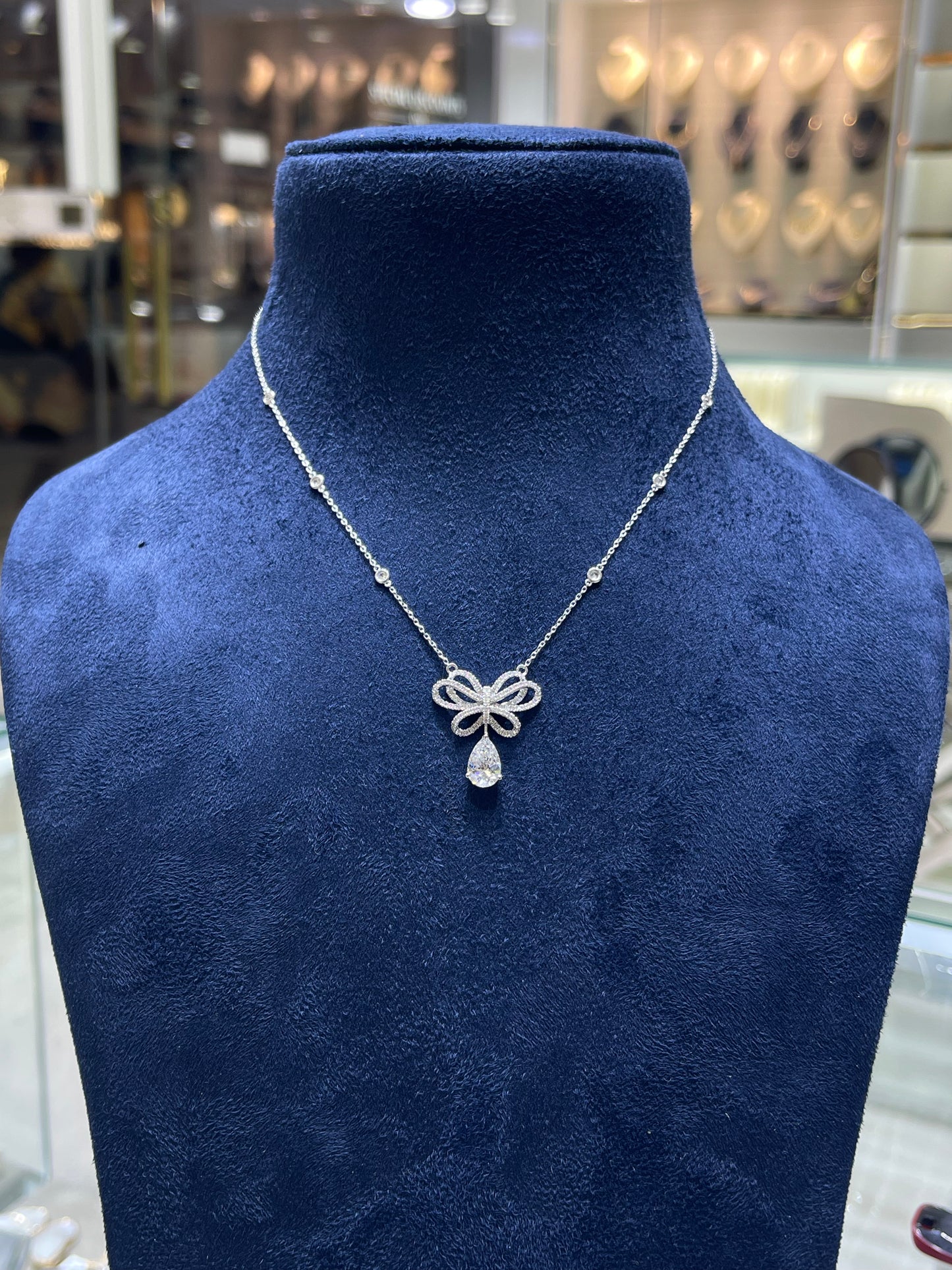 1.5CT Pear With Elegant Diamond Bow Drop Necklace in White Gold (ARJS4089)