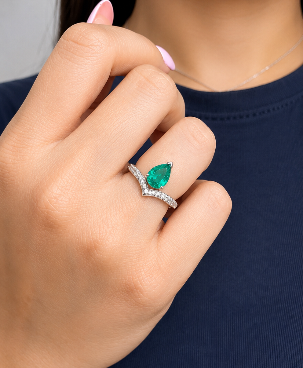 Pear Cut Emerald with Cluster Round Diamond Ring (ARJS2442)