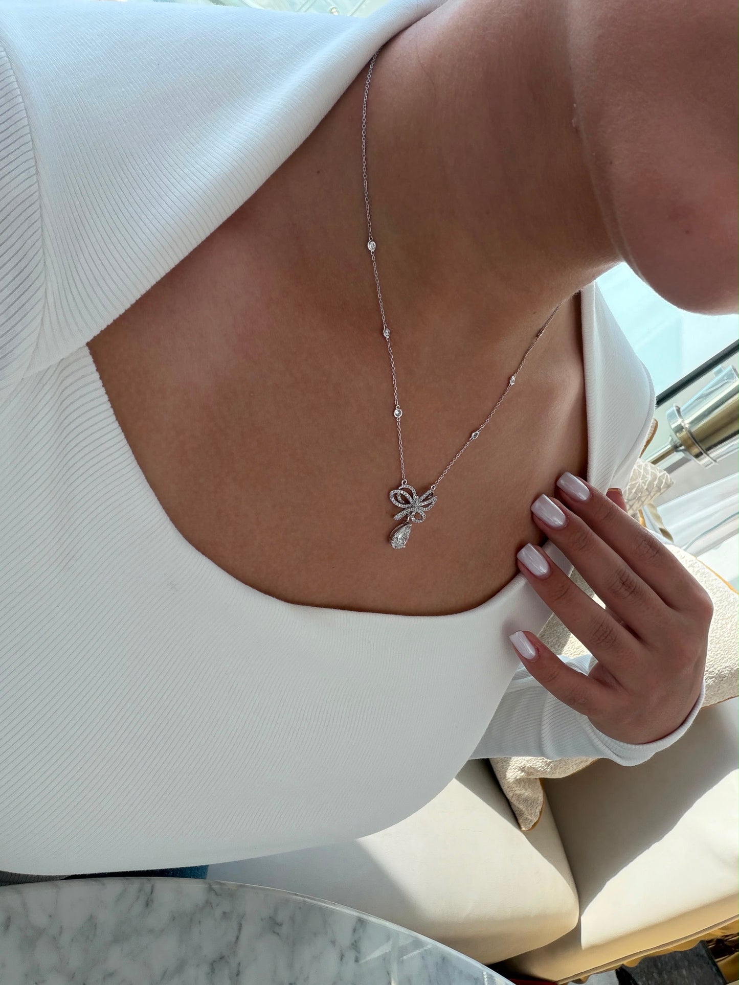 1.5CT Pear With Elegant Diamond Bow Drop Necklace in White Gold (ARJS4089)