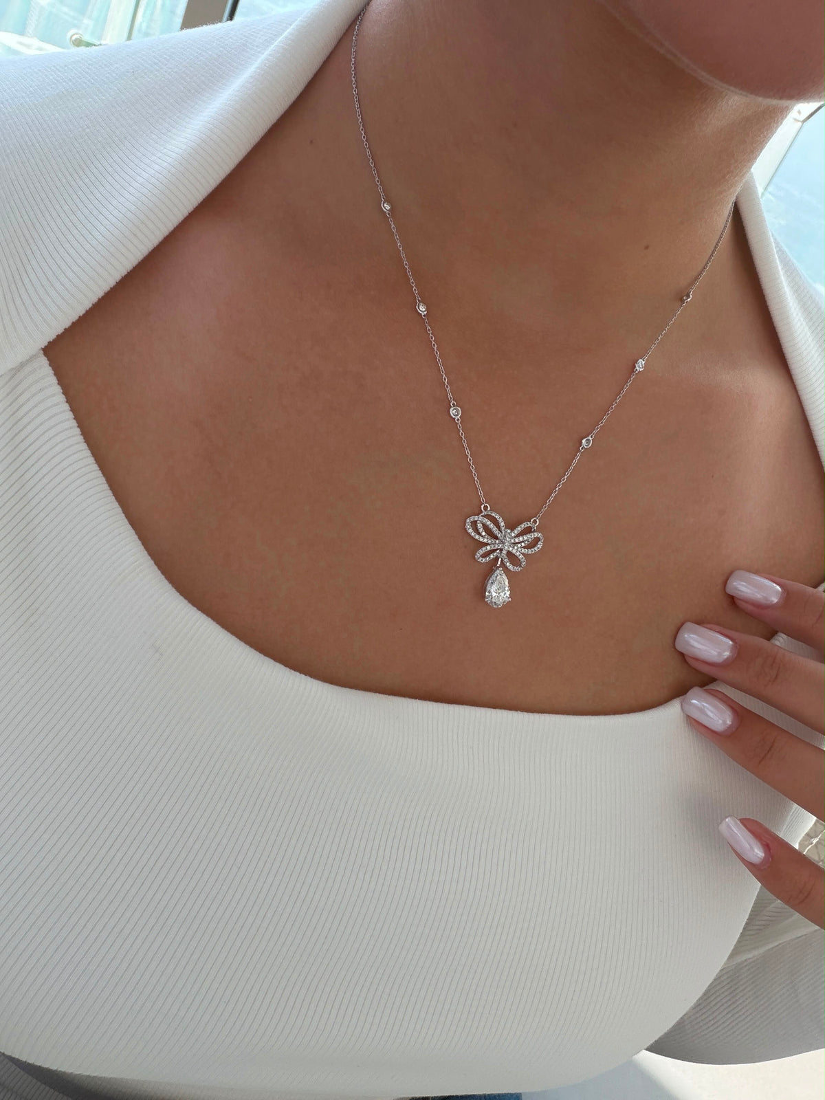 1.5CT Pear With Elegant Diamond Bow Drop Necklace in White Gold (ARJS4089)