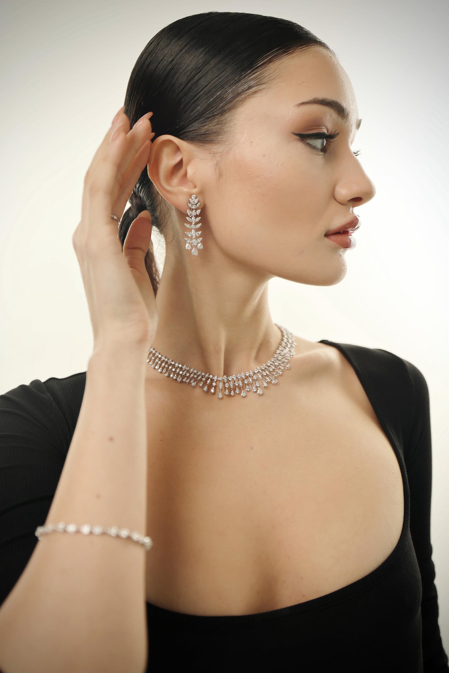 Pear with Cluster Diamond Ring (ARJS2769)