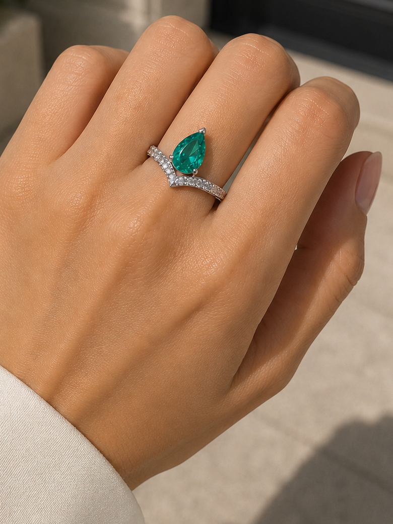 Pear Cut Emerald with Cluster Round Diamond Ring (ARJS2442)